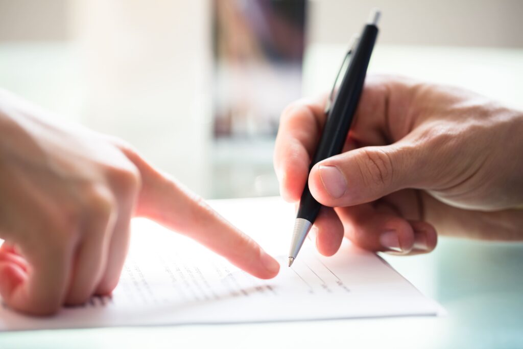 Signing property documents in Malta — buying property Malta first time buyer