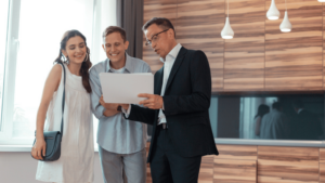 Agent showing a property to a couple