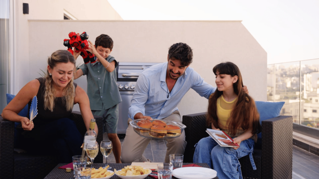 Family frame enjoying a BBQ as shown in the main campaign video